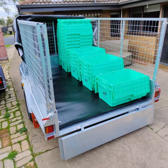 Trailer with moving crates